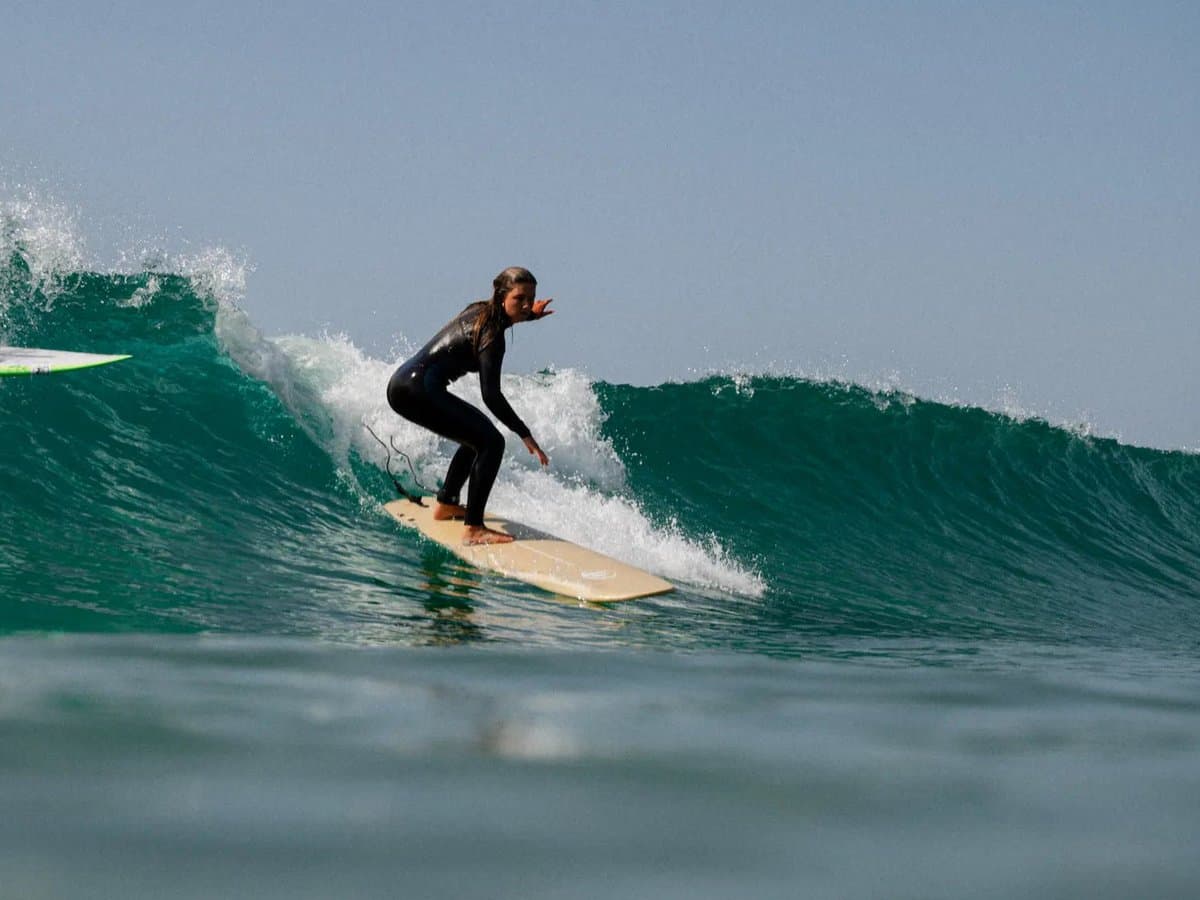 7'6 soft-top funboard rental in Aljezur — 57.5 litres for your first waves on the open face, delivered to your accommodation